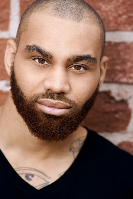 Headshot of actor with beard