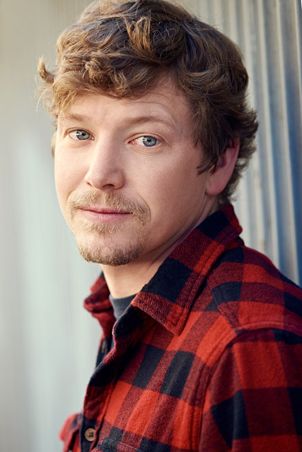 Natural light headshot of comedian and actor