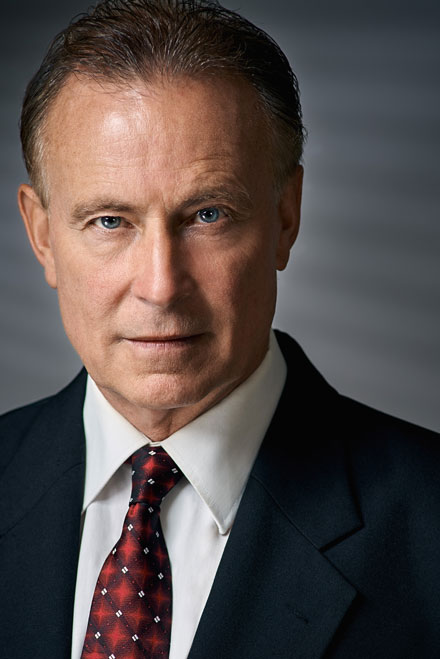 Theatrical headshot of male actor with cinematic lighting style