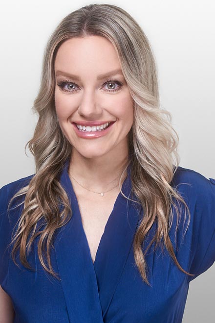 Real estate agent headshot with blue dress